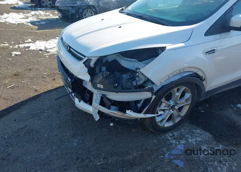 2014 Ford Escape Titanium z USA, uszkodzony, nr VIN 1FMCU9J98EUC15348